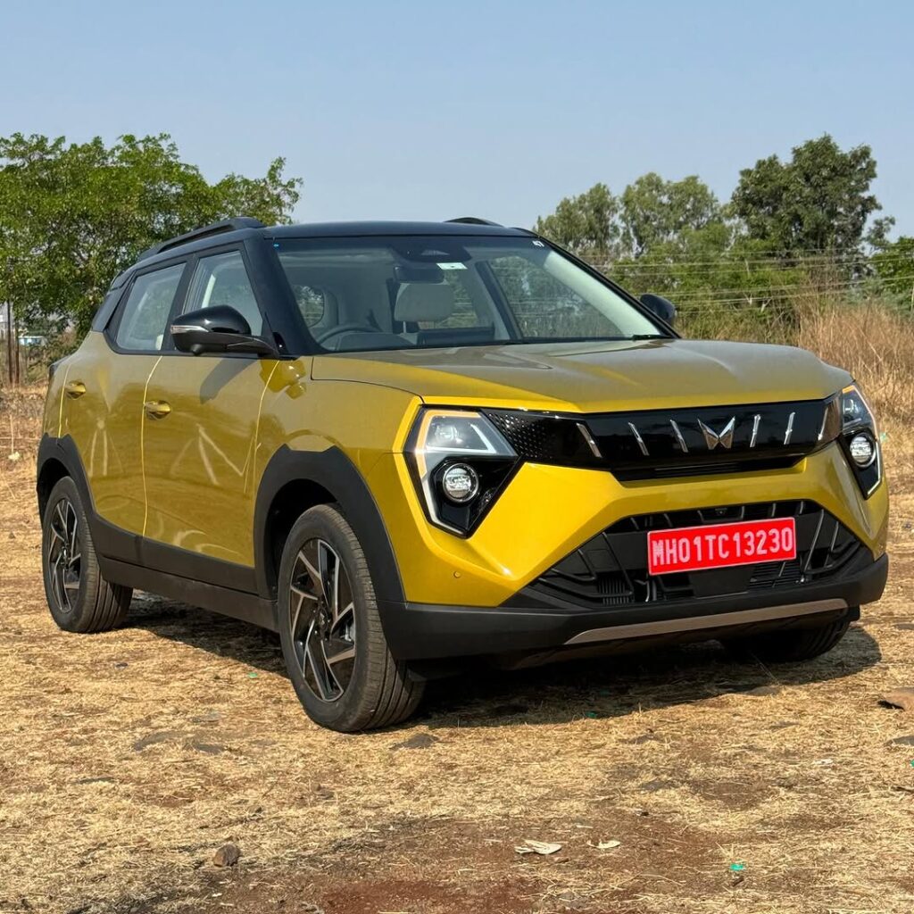 Mahindra XUV 3XO front and side view yellow colour