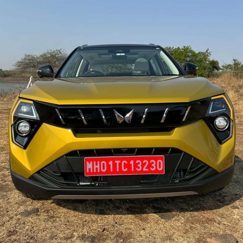 Mahindra XUV 3XO front view yellow colour